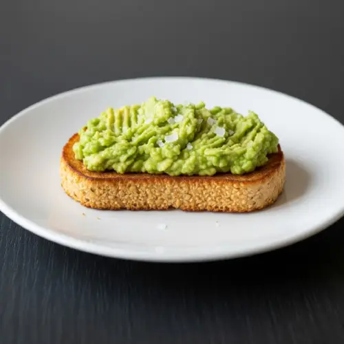 Two slices of golden-brown gluten-free toast, served crisp and perfect for pairing with breakfast favo